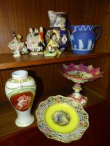 A Wedgwood jasperware jug, 13cm high, various Continental figure groups and other mainly repaired or