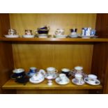 A collection of mainly 20th century cabinet cups and saucers, including Royal Crown Derby, late