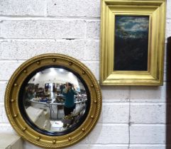 A circular convex mirror with ebonised slip and gilt-painted gesso frame, 49cm diameter and an