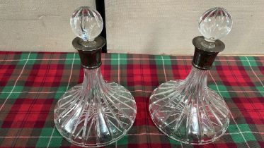 2 SILVER COLLARED DECANTERS (1 STOPPER HAS SMALL CHIP-AF)