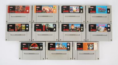 An assortment of loose PAL Super Nintendo (SNES) cartridges (x11) Highlights include: Beethoven,