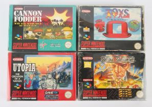 Super Nintendo (SNES) strategy game bundle Includes: Toys, Metal Marines, Cannon Fodder and Utopia