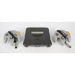 Nintendo 64 (N64) Console + 2 grey controllers and power supply