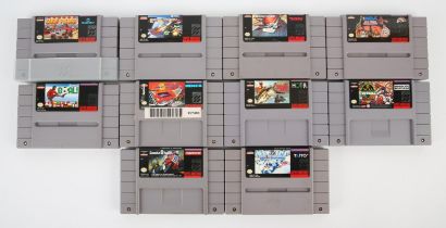 An assortment of loose NTSC Super Nintendo (SNES) cartridges (x10) Highlights include: Earth