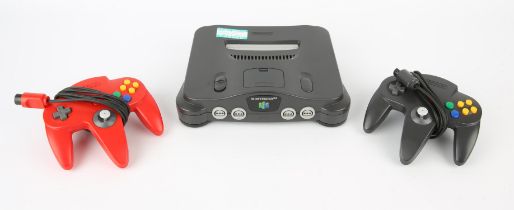 Nintendo 64 (N64) Console + 1 black controller, 1 red controller & power supply