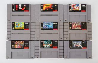 An assortment of loose NTSC Super Nintendo (SNES) cartridges (x9) Highlights include: Teenage