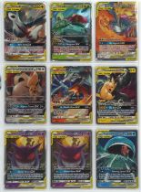 Pokemon TCG. Lot of 16 Pokémon Tag Team GX cards including popular cards such as Charizard and