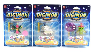 Three original Bandai boxed Digimon Figures featuring Lillymon, Palmon and Ikkakumon.