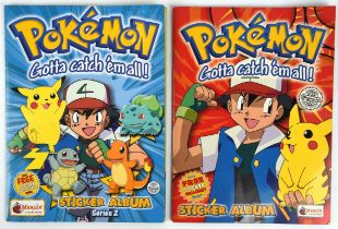 Pokemon TCG. Pokemon Merlin Series 1 and 2 Sticker Albums part complete with some stickers inside.