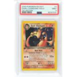 Pokemon TCG. Dark Charizard 1st Edition Holographic Pokémon Card. Number 4/82 graded PSA 9 Mint.