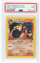 Pokemon TCG. Dark Charizard 1st Edition Holographic Pokémon Card. Number 4/82 graded PSA 9 Mint.