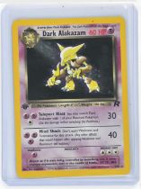 Pokemon TCG. Dark Alakazam 1/82 1st Edition Holo from Team Rocket.