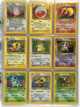 Pokemon TCG. Pokemon Jungle Unlimited Complete set, 64/64 cards with a additional Vaporeon