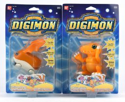 Two original Bandai boxed Digimon talking figures featuring Agumon and Patamon.