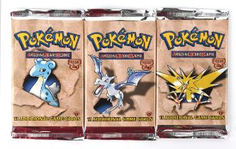 Pokemon TCG. Complete art set of Pokémon Fossil 1st edition sealed Booster Packs.