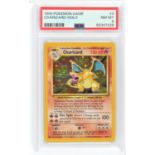 Pokemon TCG. Charizard Base Set Holographic Pokémon Card. Number 4/102 graded PSA 8.