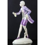 Josef Lorenzl for Goldscheider, a pottery figure of a Dandy, on an oval base, printed marks,