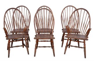 Slovenian Design, six spindle back chairs, in the manner of Ercol, to include two armchairs,