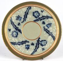 James Macintyre & Co. Gesso Faience plate, with green and gilt bands and tube lined with stylised