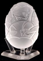 Lalique, a frosted glass egg moulded with crickets, with box and papers, the egg 7cms