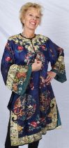 A blue Chinese embroidered silk jacket/Kimono. Late Qing dynasty with silk embroidery depicting