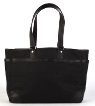 Addendum description. COACH a large black canvas and leather work bag or ladies briefcase with