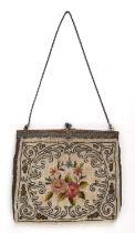 An Edwardian evening bag. A good quality Art Deco silver metal-framed probably French ornately