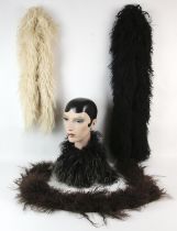 Four good quality Mongolian and Tibetan lamb long fur scarves/stoles.