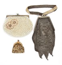 Two Edwardian evening bags and a purse. An Art Deco framed silver chain Tango bag with loop strap