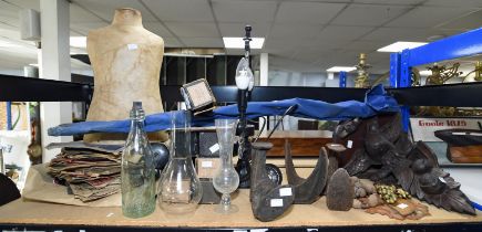 Collection of items, two include two shoe makers irons, a wall bracket with eagle support,