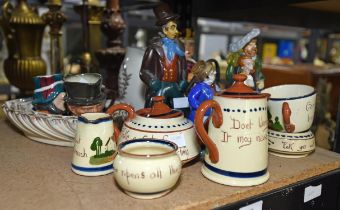 A Wedgwood & Co Ltd pottery toby jug, of a seated king, together with 3 small pottery toby jugs,