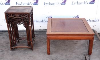 A Chinese nest of four rosewood occasional tables,1900s, with panelled tops and pierced aprons,