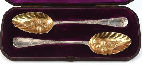 Cased pair of Georgian silver berry serving spoons. London 1787, 215mm Long.