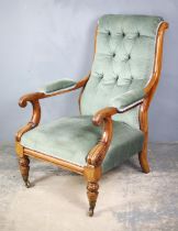A William IV mahogany and upholstered armchair, the shaped back above padded open arms with scroll