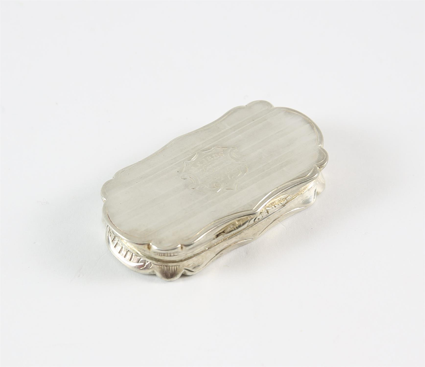 A Victorian silver vinaigrette, Birmingham, 1853, Nathaniel Mills, of cartouche form,