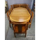 A Chinese 18th century style hardwood dining suite, modern, to include a panelled sideboard,