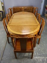 A Chinese 18th century style hardwood dining suite, modern, to include a panelled sideboard,