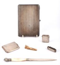 Cigarette case, paper knife, two vesta cases, pen knife, mouth organ (6)