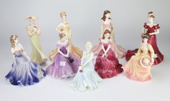 A group of nine Coalport Bone China figurines, to include five from the Ladies of Fashion Range,
