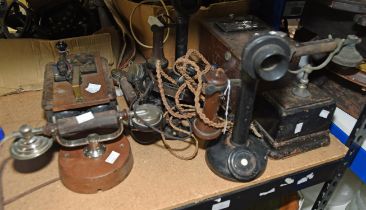 Two stem form telephones, 31cm high, together with other telephone receivers, a Morse key device