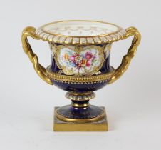 Royal Worcester porcelain urn, 20th Century, painted with reserves of flowers within gilt frames,