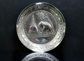 Indian silver white metal dish by KAA with scenes of an elephant near a temple.