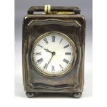 Silver case carriage clock, the case with moulded panelled sides and top, on bun feet,