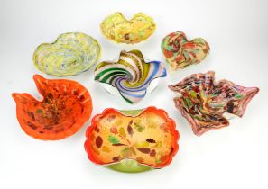 A group of seven Italian glass bowls, probably Murano, of various stylised leaf forms with folded