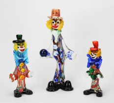 A group of three Murano glass clowns, together with three Murano glass cockerels and a Murano clear