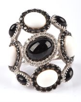 Carlo Viani black onyx, white agate and diamond ring, designed as five cabochon cut onyx,