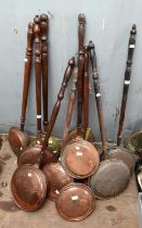 Collection of ten brass bedwarmers, with turned wooden handles (10)