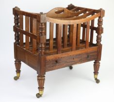 A George IV rosewood Canterbury, 1820s, of four division form with concave dividers and turned