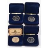 Four cased silver crown coins with C.O.A