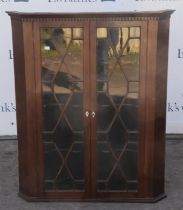 Mahogany corner cabinet, 19th Century, with two glazed doors enclosing shelves, H109 x W90.5 x 50D